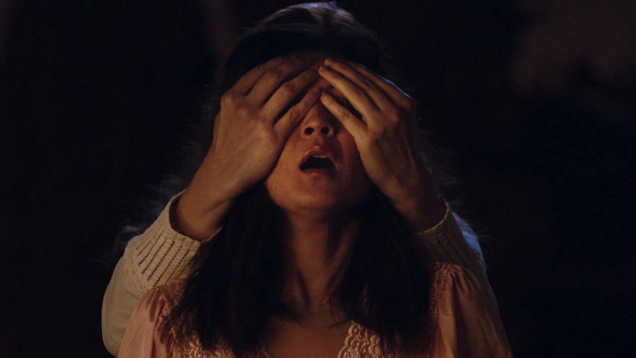 Michelle Krusiec as Claire Yang - They Live in the Grey - Photo Credit: Shudder - 2022